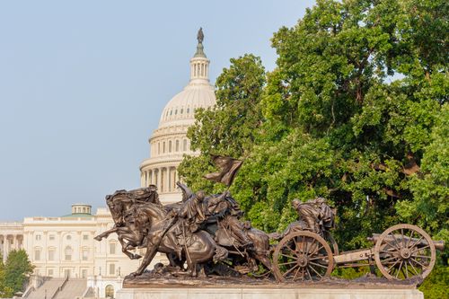 Free Statue depicting Civil War in front of the iconic US Capitol dome in Washington, D.C. Stock Photo