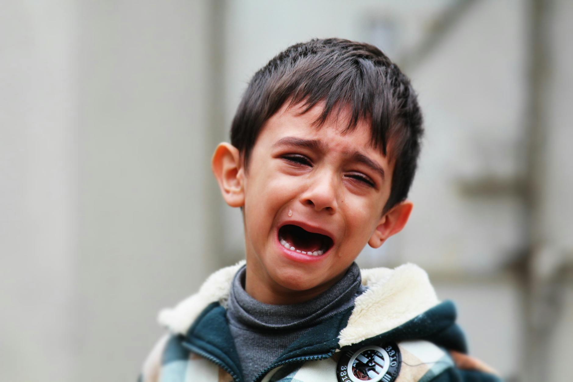 A boy crying.^[[Image](https://www.pexels.com/photo/boy-child-crying-iraq-39815/) on [Pexels](https://www.pexels.com/)]