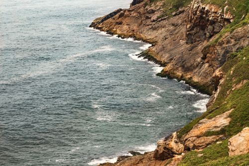 Free Dramatic coastal cliffs overlooking the ocean during the daytime in Brazil. Stock Photo