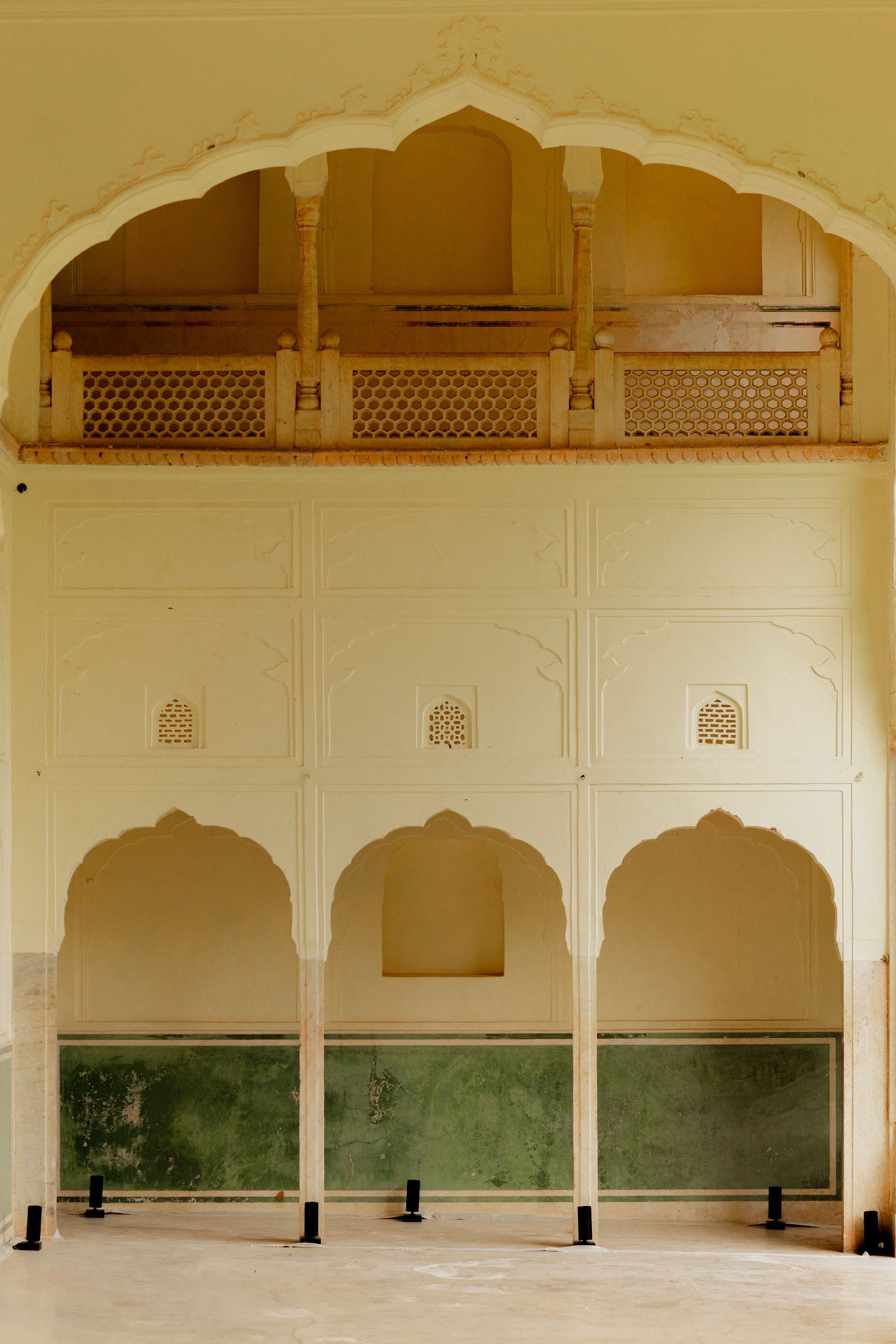 Sophisticated historical interior showcasing intricate arches and traditional architectural details.