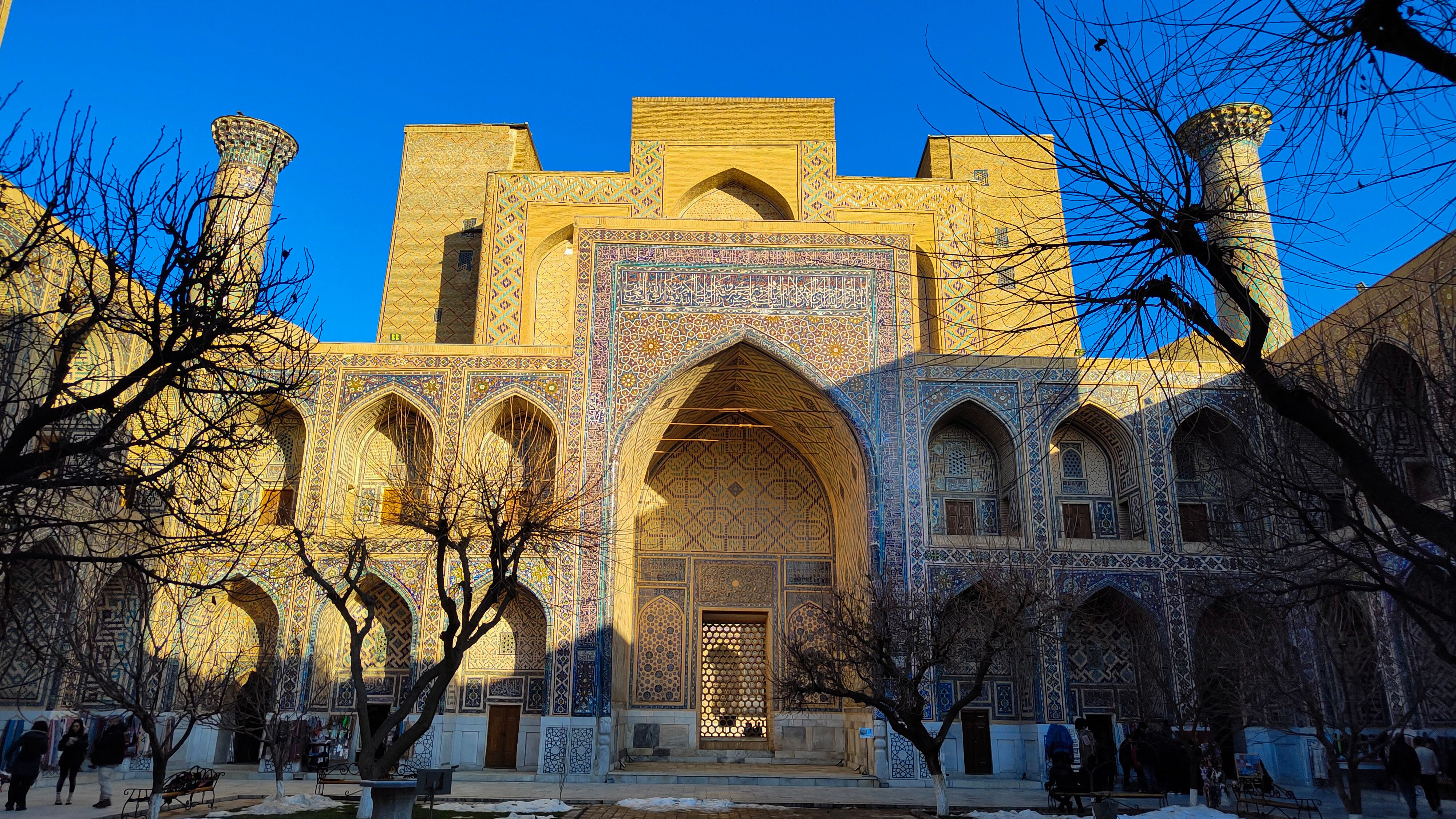 Discover the stunning Islamic architecture of Samarkand with intricate tilework and ornate facades.