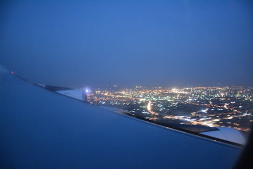 Free stock photo of airplane view, blue sky, city at night