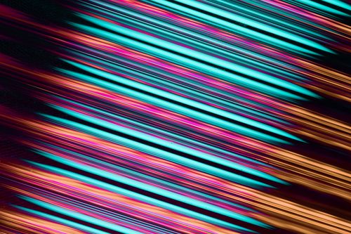 Free Vibrant abstract background with dynamic neon lines creating a futuristic and energetic feel. Stock Photo