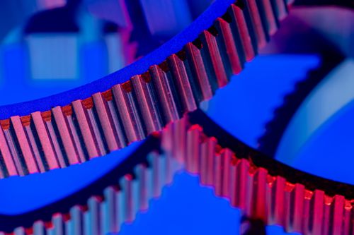 Free Colorful close-up of interlocking gears showcasing precision engineering. Stock Photo