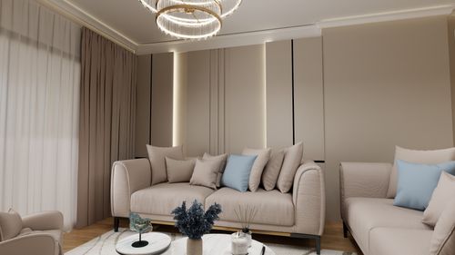 Free Luxurious living room with beige sofas, blue pillows, and elegant chandelier. Stock Photo