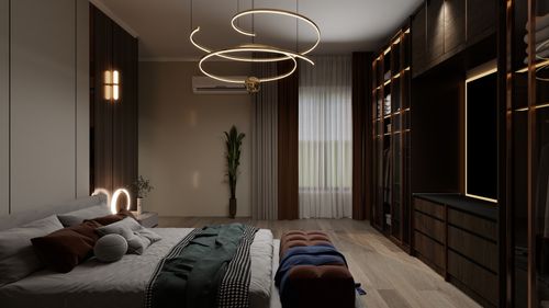 Free Elegant modern bedroom featuring stylish lighting, cozy bed with cushions, and chic decor elements. Stock Photo