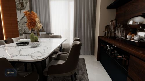 Free A stylish dining room featuring a marble table, modern decor, and natural lighting. Stock Photo