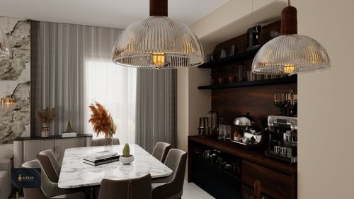 Free Contemporary dining room with marble table, stylish decor, and pendant lighting. Stock Photo