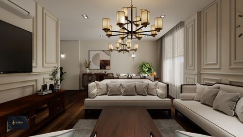 Free Luxurious living room showcasing stylish furniture and a modern chandelier. Stock Photo