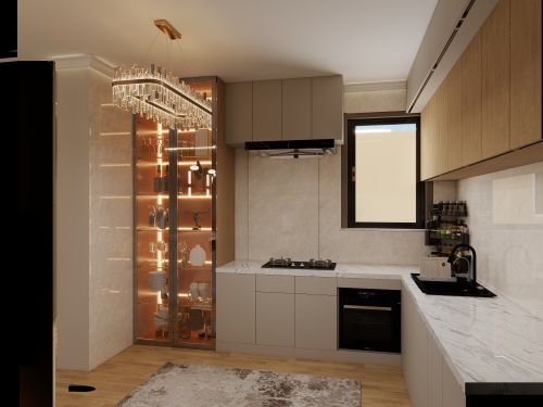 Free Stylish modern kitchen featuring marble countertops, a chandelier, and sleek cabinetry. Stock Photo