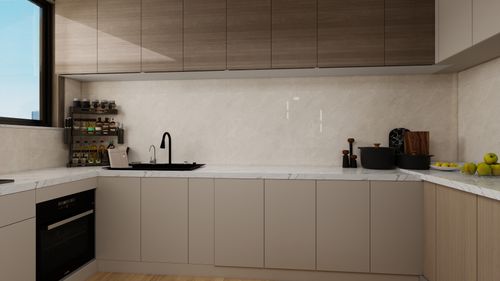 Free Elegant modern kitchen with minimalist design and natural light. Stock Photo