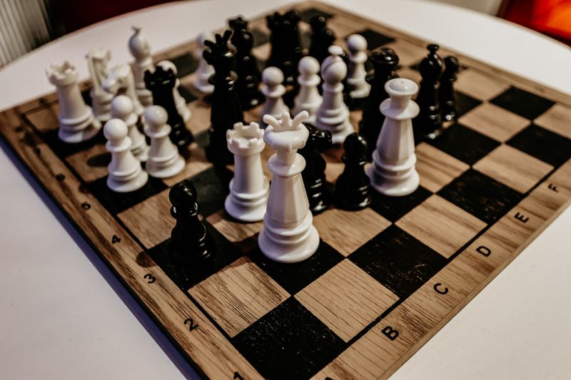 Detailed view of a chess game in progress, showcasing intricate strategy.