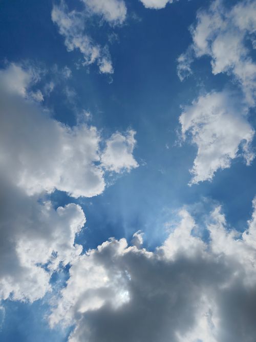 Free Captivating view of blue sky with fluffy cumulus clouds in Silchar, India. Stock Photo