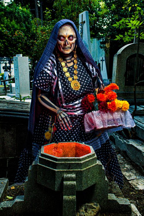 Free Vibrant image of a skeletal figure in traditional dress during Day of the Dead celebration. Stock Photo