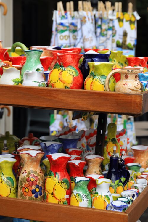 Free Vibrant display of ceramic vases in Limone sul Garda, Italy. Perfect for travel and culture imagery. Stock Photo