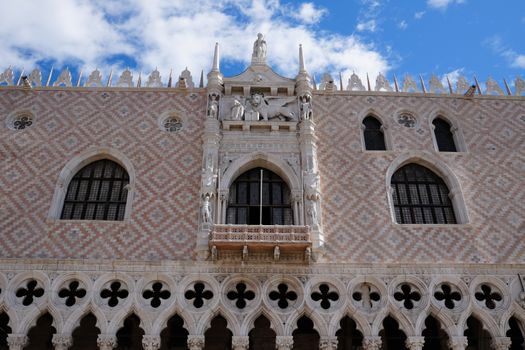 Explore the intricate Venetian Gothic architecture of Doge's Palace in Venice, Italy.