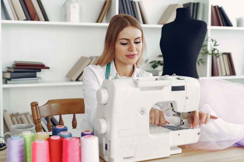 Domestic sewing machine in use