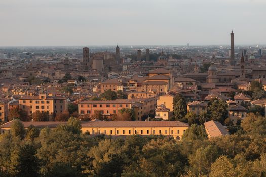 A stunning aerial view of Bologna, Italy showcasing historic architecture and iconic towers at dusk.