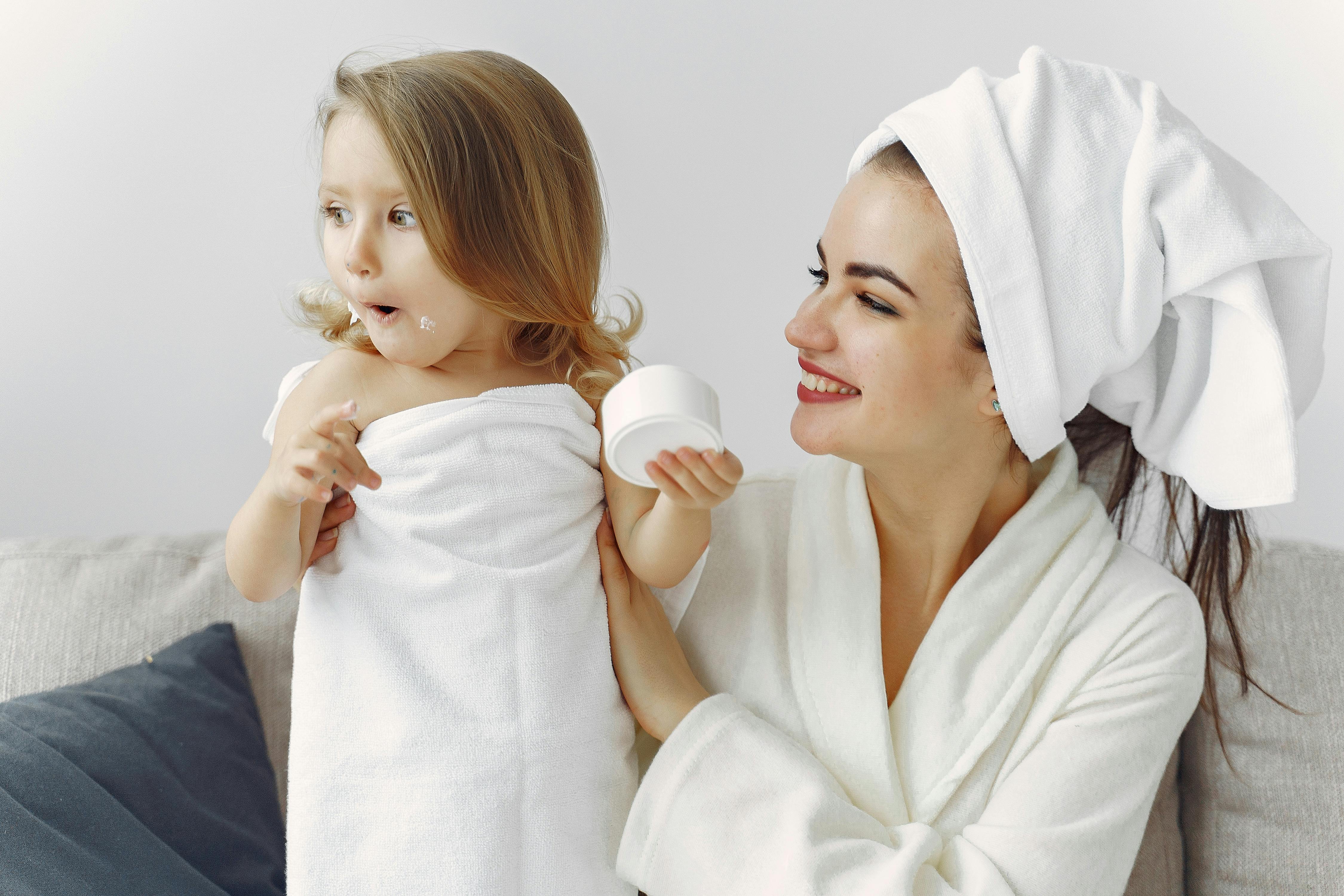 Mother and Daughter Had a Day of Spa. they Have Fun in White Bath Towels  Stock Image - Image of health, luxury: 105008699