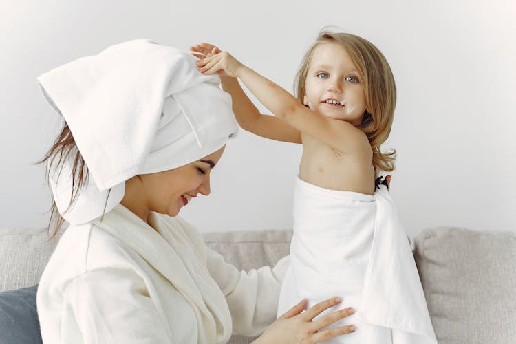 Little Girl Wrapped In Bath Towel