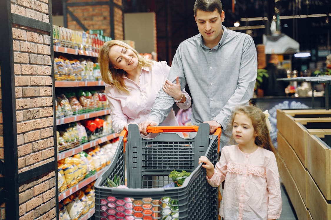 Free People in a Supermarket Shopping  Stock Photo