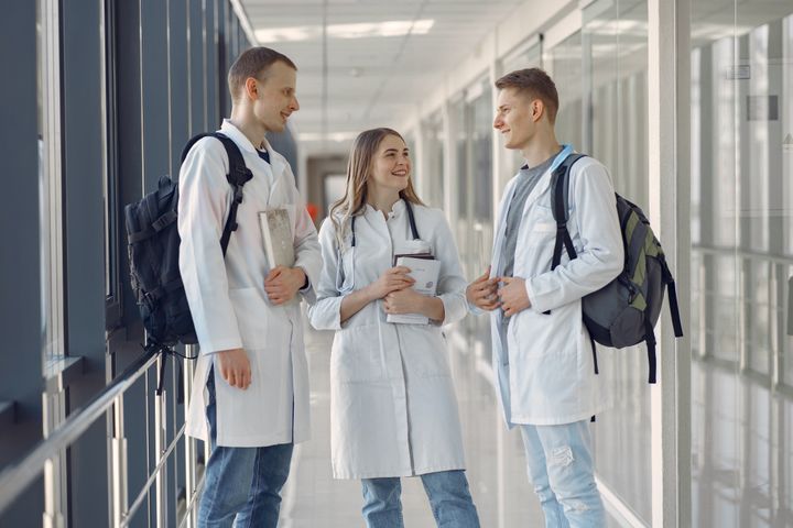 Three members of our clinical team in the clinic corridor