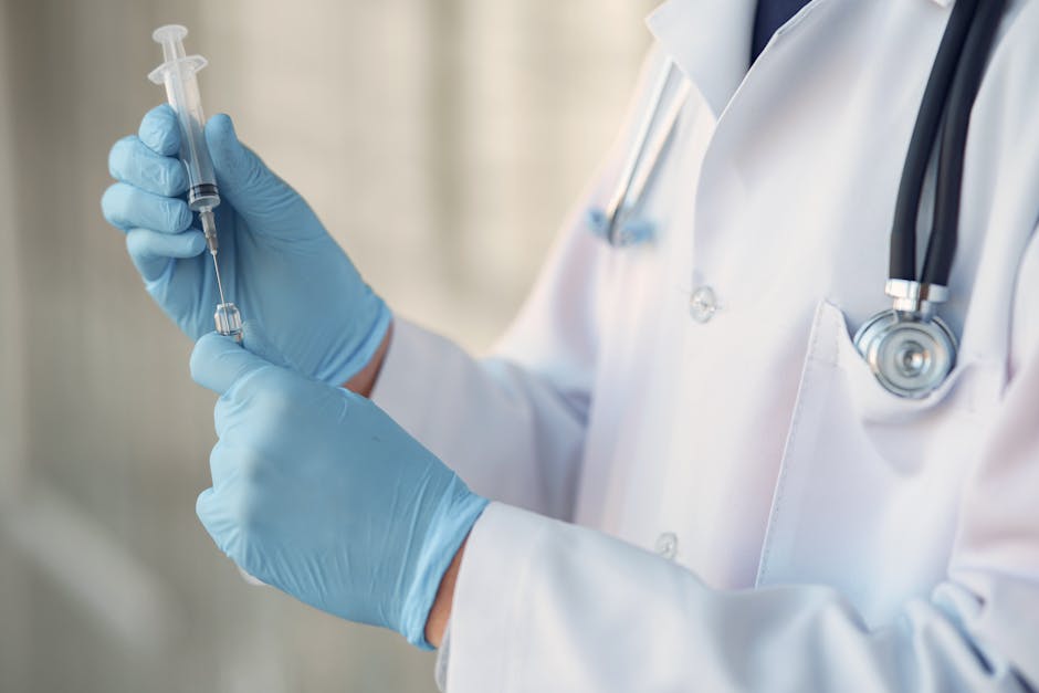 Medical professional with syringe