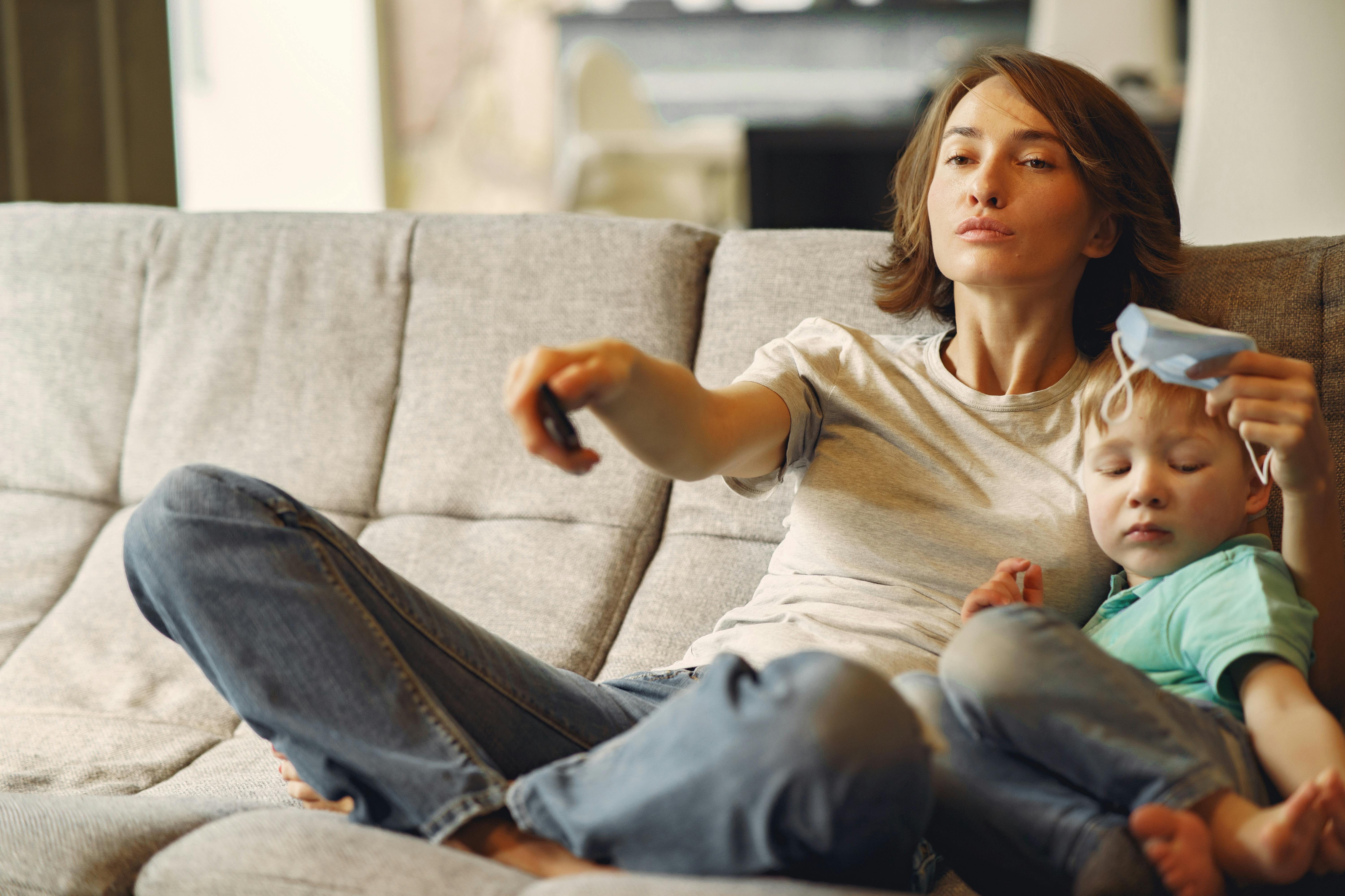 family relaxing comfortably in their living room - heat pump replacement in leavenworth, wa