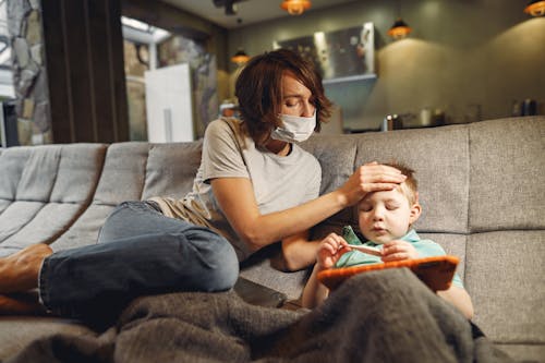 Free Worried About Her Sick Son Stock Photo