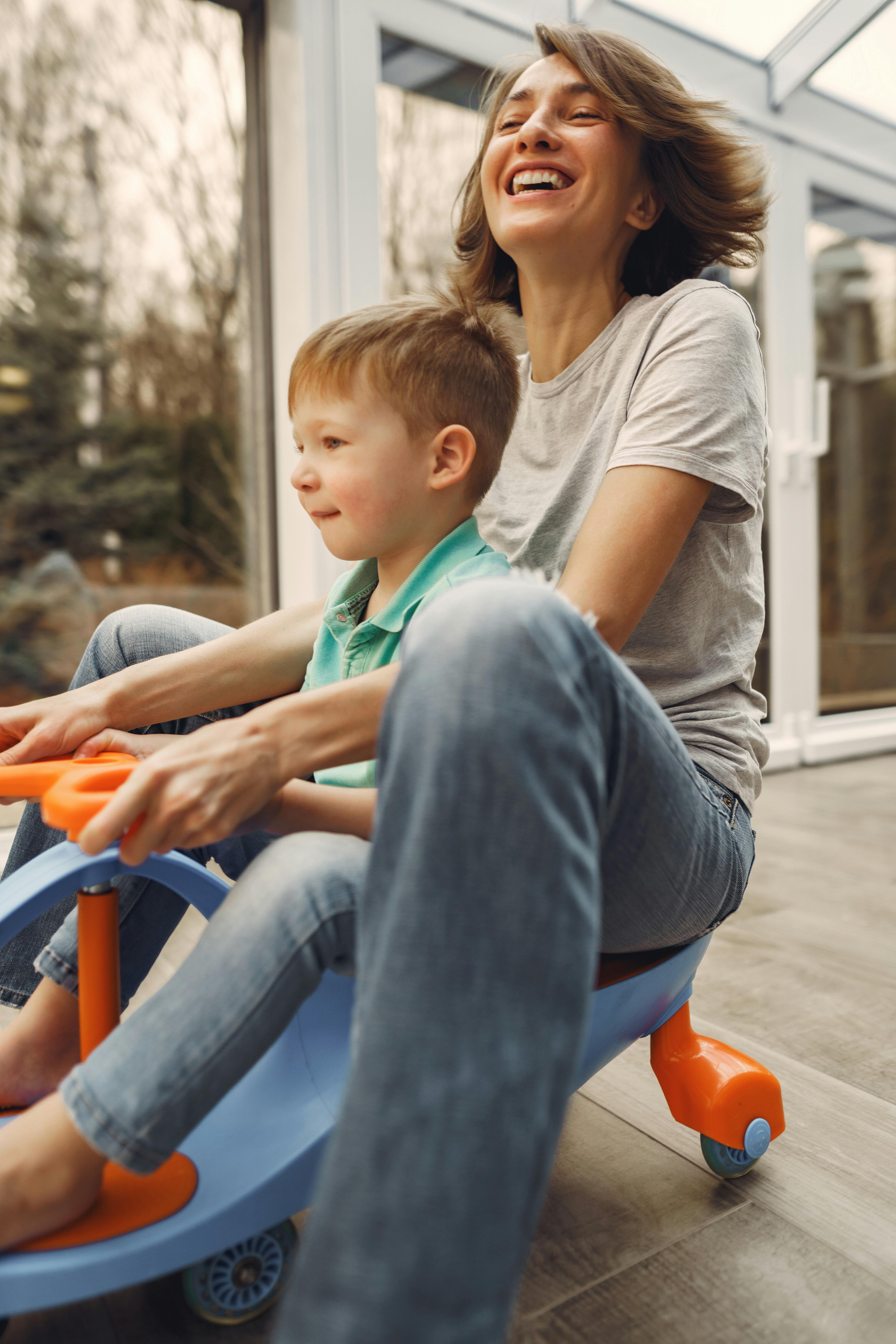 mother and son riding a twist car