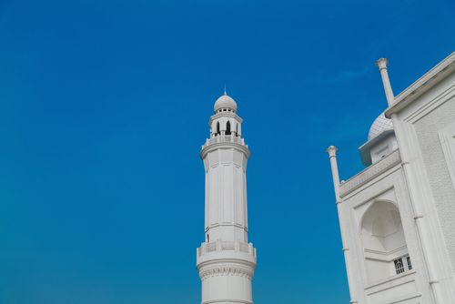 Free Elegant white mosque minaret with clear blue sky in West Java, Indonesia. Stock Photo