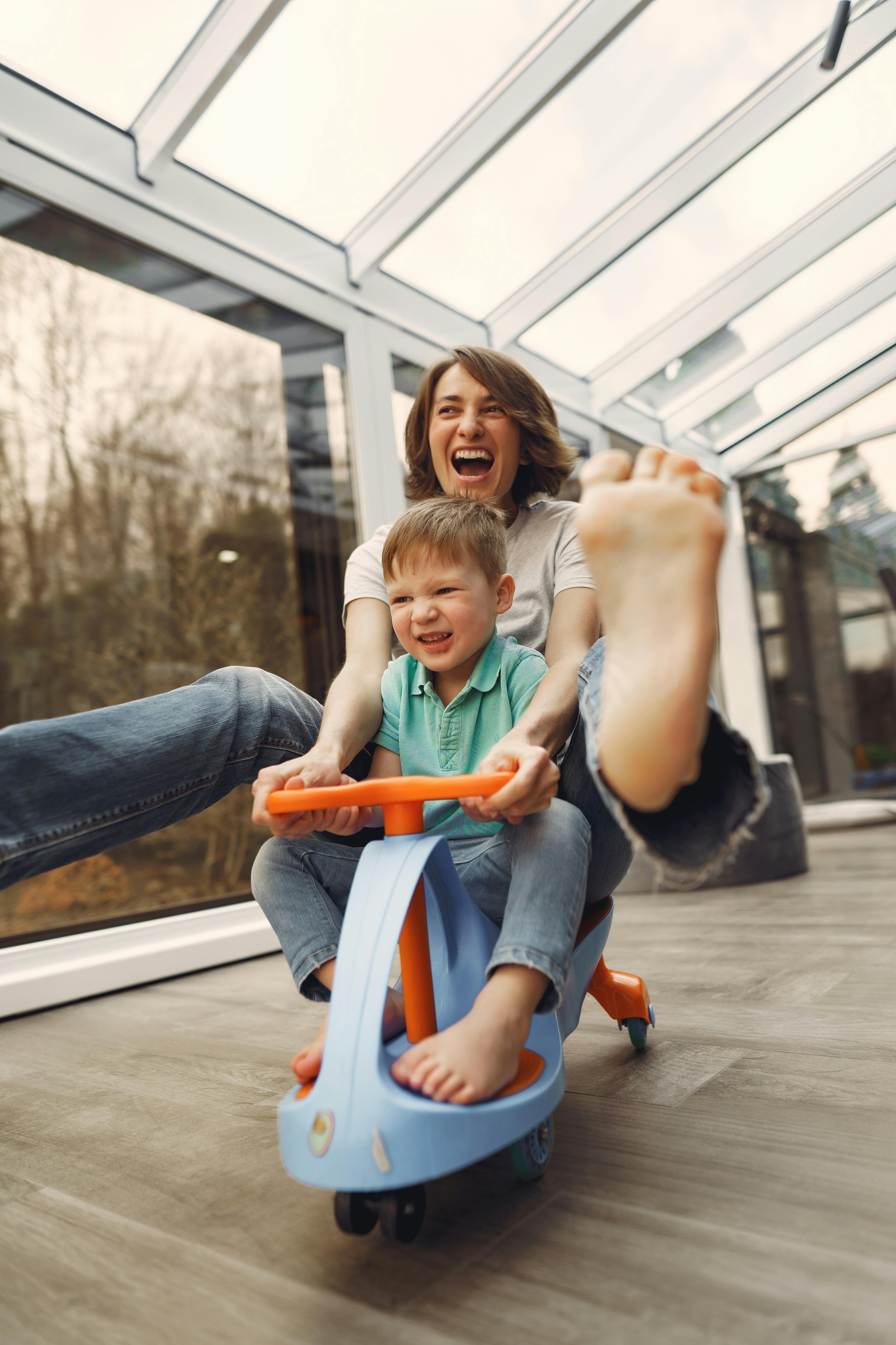 mother and son riding a twist car