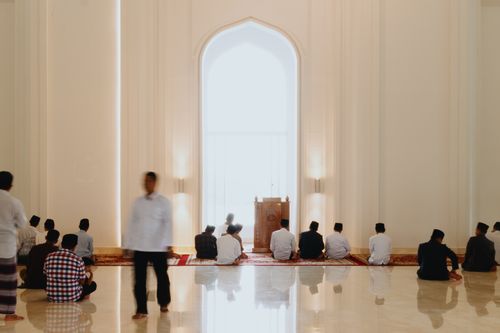 Free People gathered in a mosque in West Java, Indonesia, engaged in prayer and reflection. Stock Photo