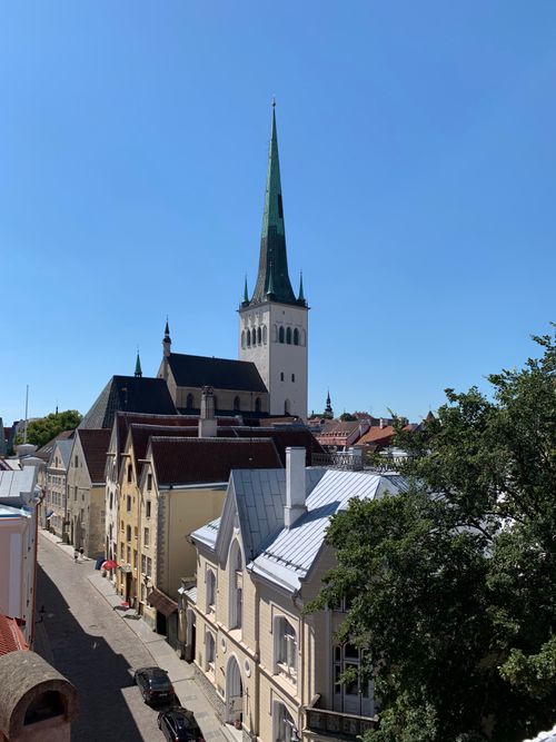 Free Beautiful view of St. Olaf's Church spire under a clear blue sky in Tallinn, Estonia. Stock Photo