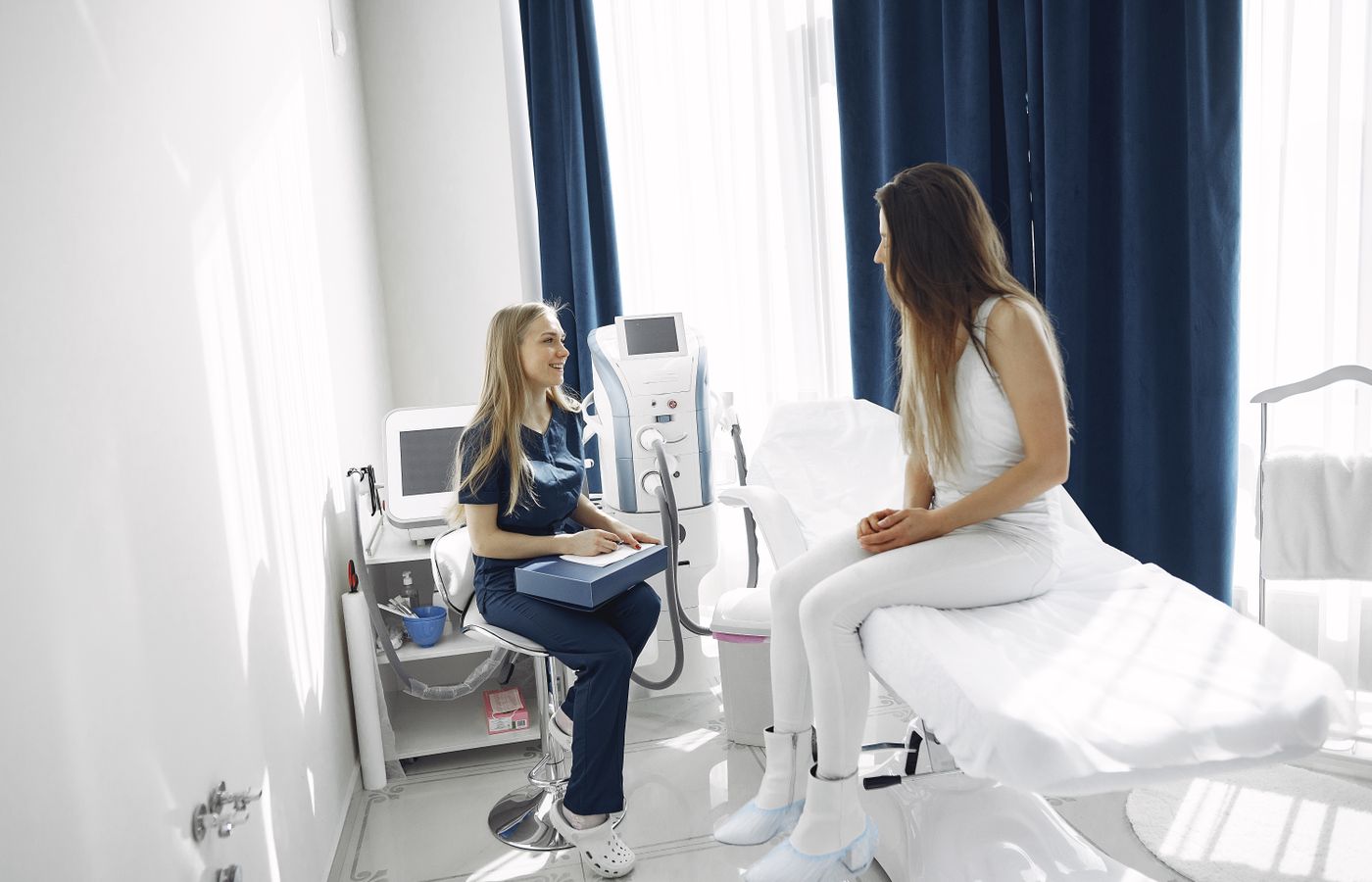 Wellness practitioner speaking with a patient