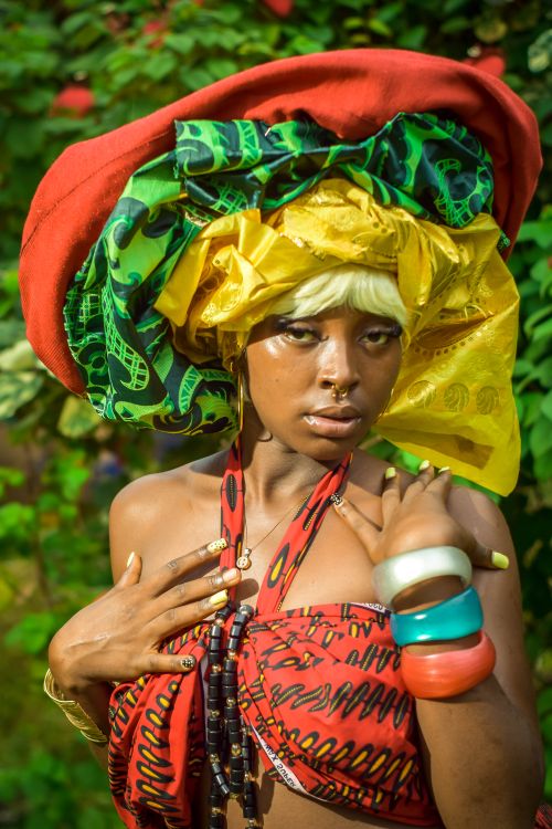 Free Stylish portrait of a woman in vibrant traditional fashion and dramatic makeup. Stock Photo