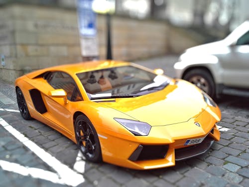 Free Yellow Sports Car during Day Time Stock Photo