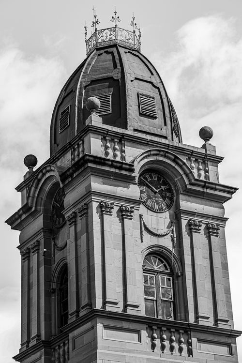 Free Monochrome image of a historic clock tower in Oudtshoorn, South Africa. Stock Photo