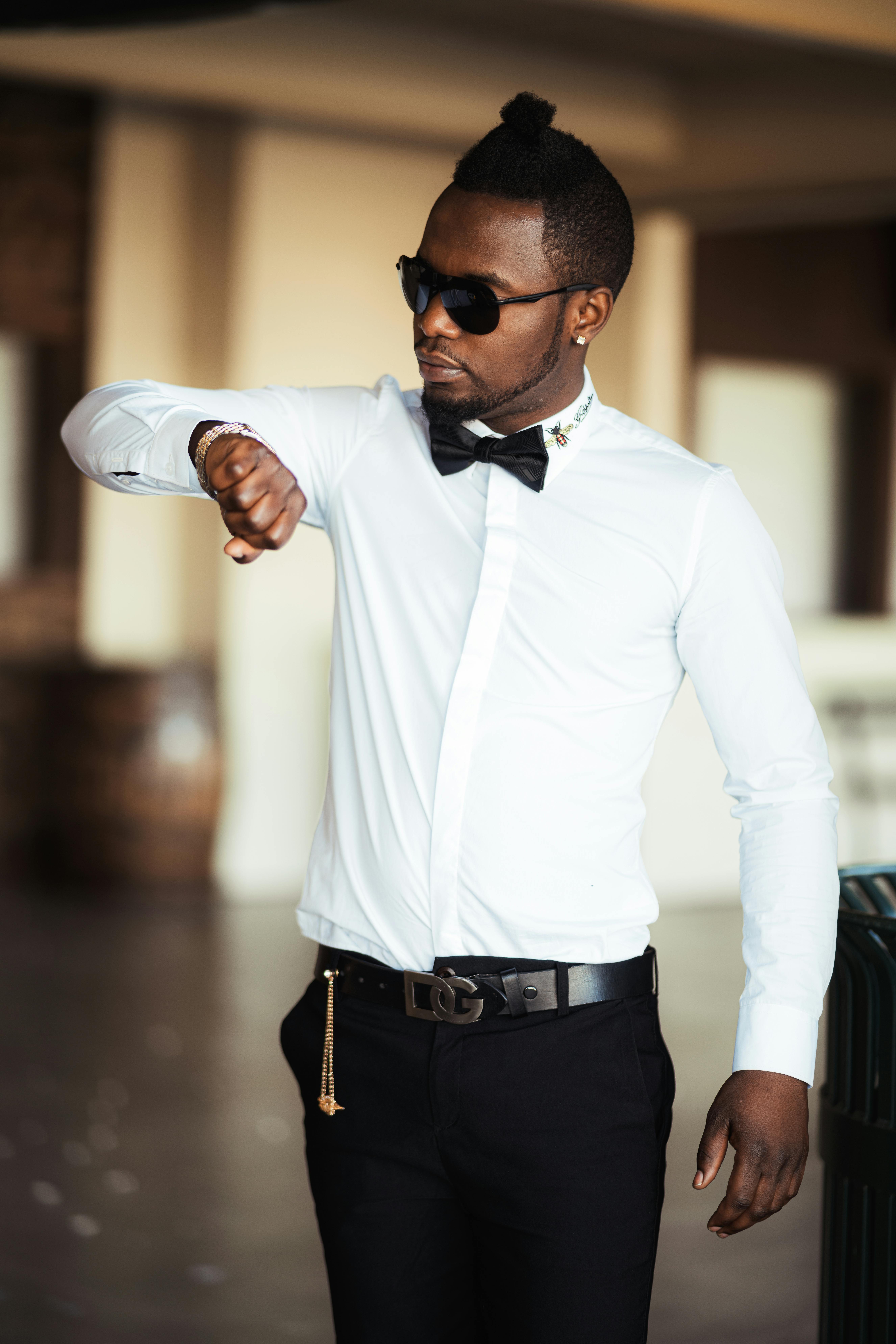 Premium Photo  Handsome man wearing formal casual wear white shirt and black  pants