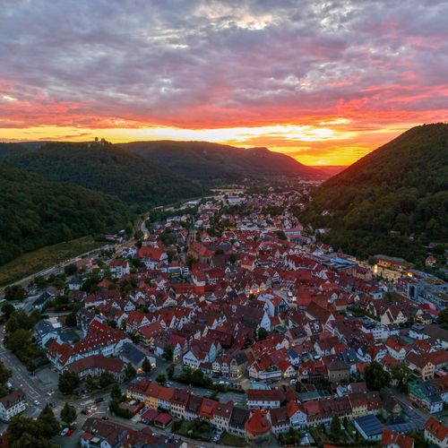 Free Stunning aerial view of Bad Urach, Germany at sunset with vibrant colors. Stock Photo