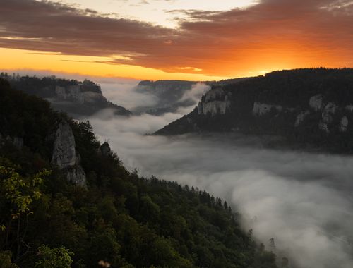 Free Breathtaking view of the Swabian Jura mountains with fog and vibrant sunset in Baden-Württemberg, Germany. Stock Photo