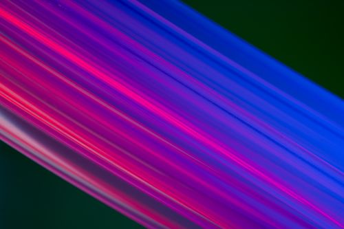 Free Dynamic neon light trails in a colorful abstract composition. Stock Photo