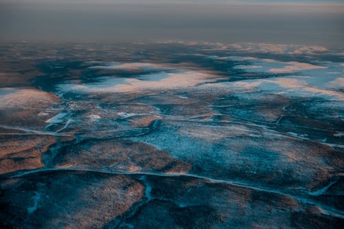 Aerial Shot Of Snow Covered Field