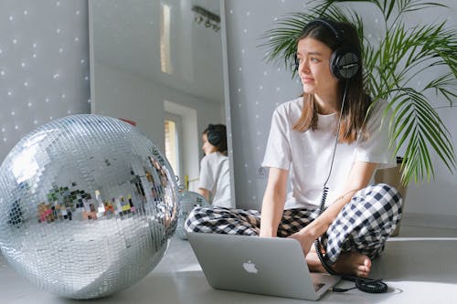 Free Woman In White Crew Neck T-shirt Using Macbook Stock Photo