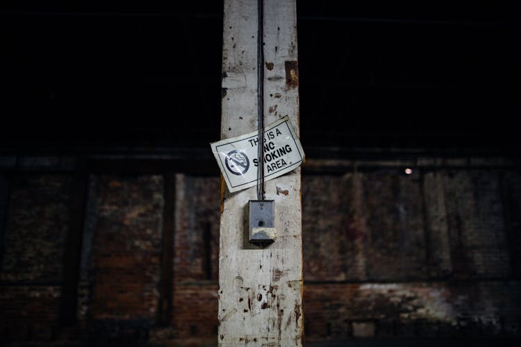 No Smoking Signage On A Column Post 