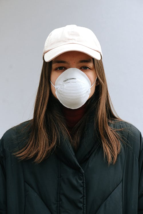 Woman Wearing White Face Mask