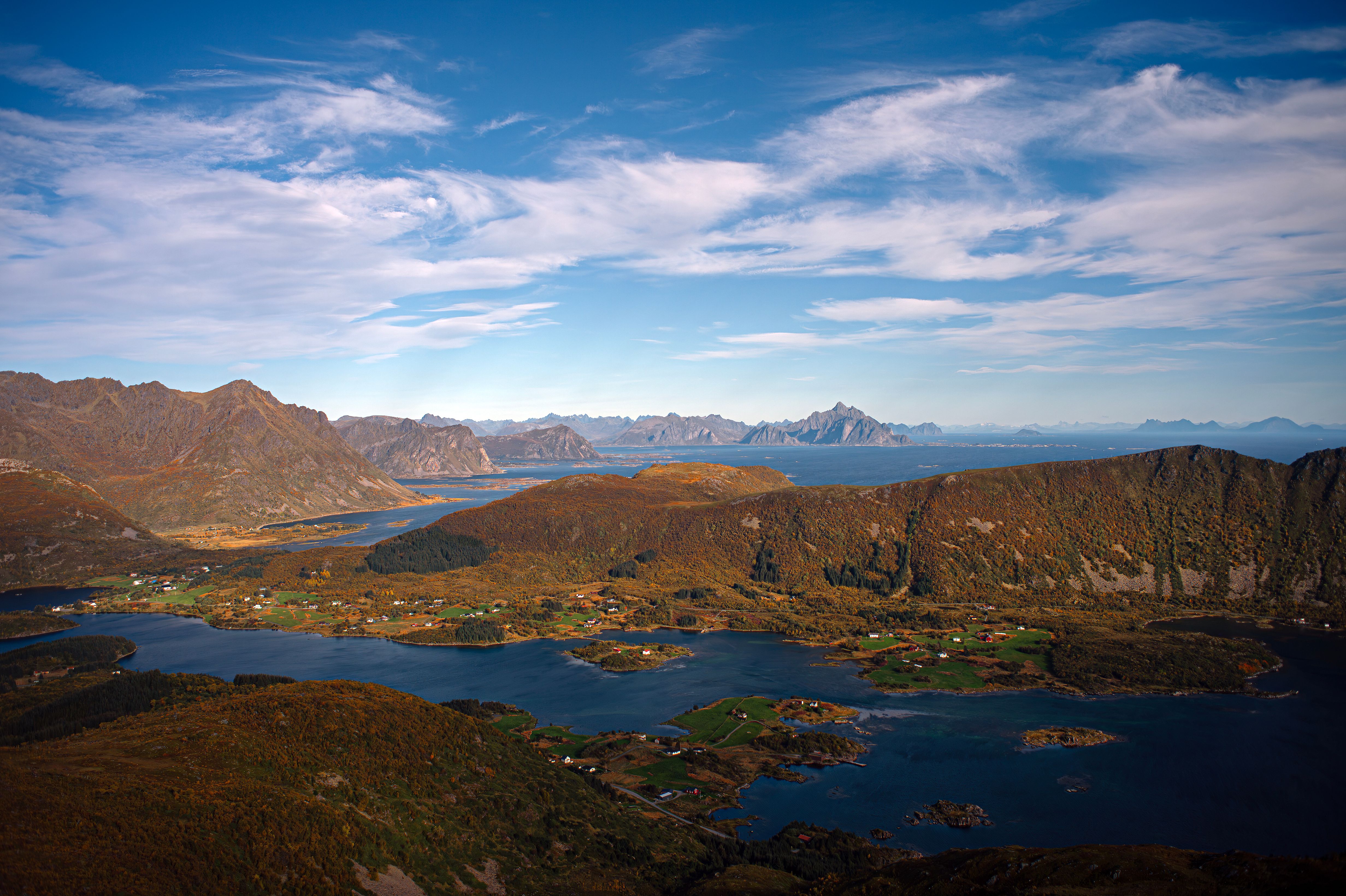 A breathtaking aerial view of Nordland, Norway, showcasing its stunning coastline and majestic mountains.
