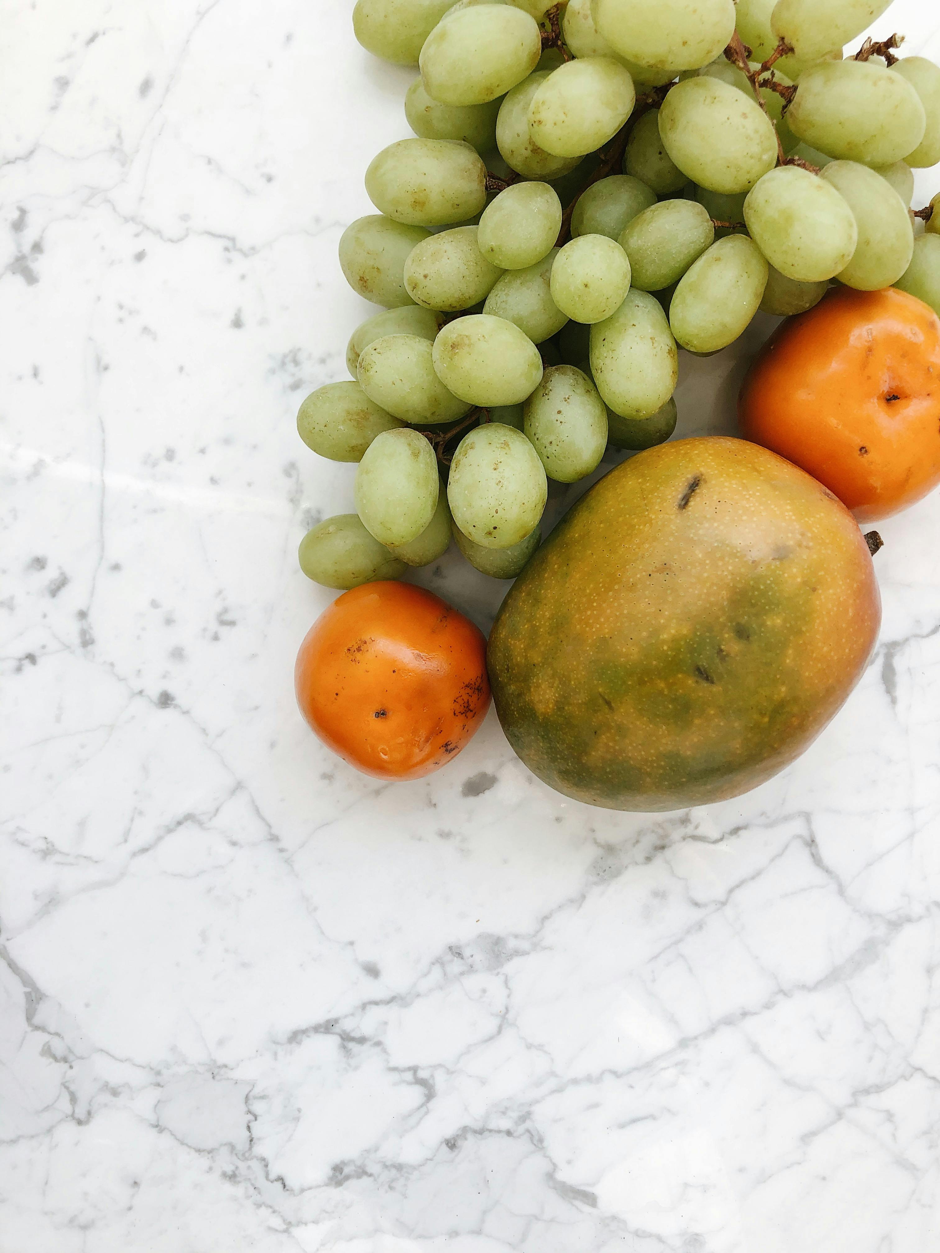 Healthy Fruits on Marble Table · Free Stock Photo