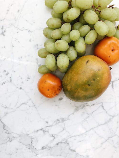 Healthy Fruits on Marble Table