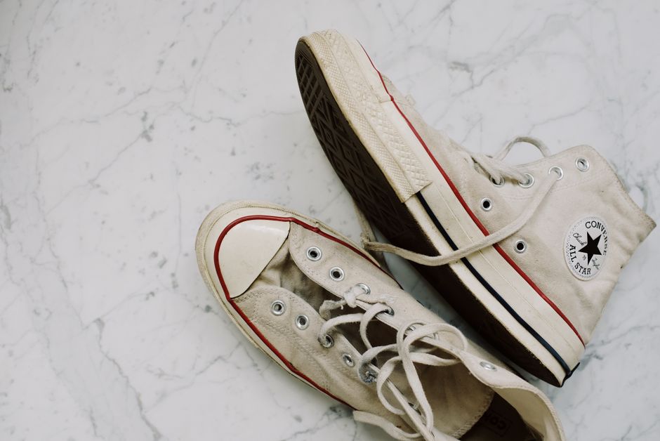 Converse Chuck Taylor All Star Low Top sneaker in Optical White, shown on Amazon product page
